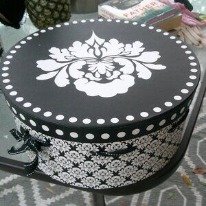 Vtg hat box floral black white 13 in 8 in H very good vintage